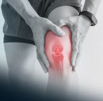 Bone in knee highlighted while gripped in pain